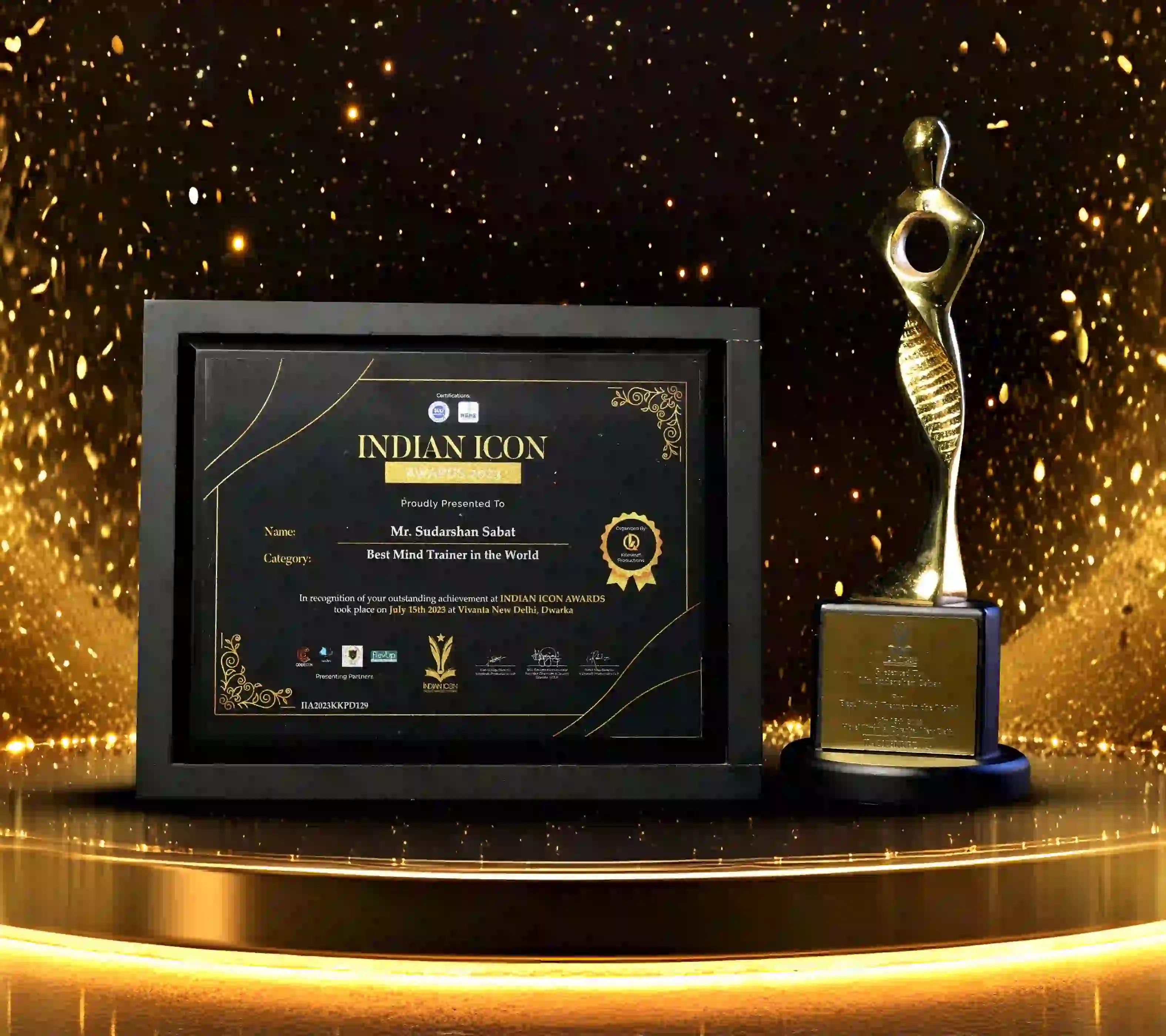 Indian Icon Awards 2023 certificate and trophy presented to Mr. Sudarshan Sabat as Best Mind Trainer in the World for outstanding achievement.