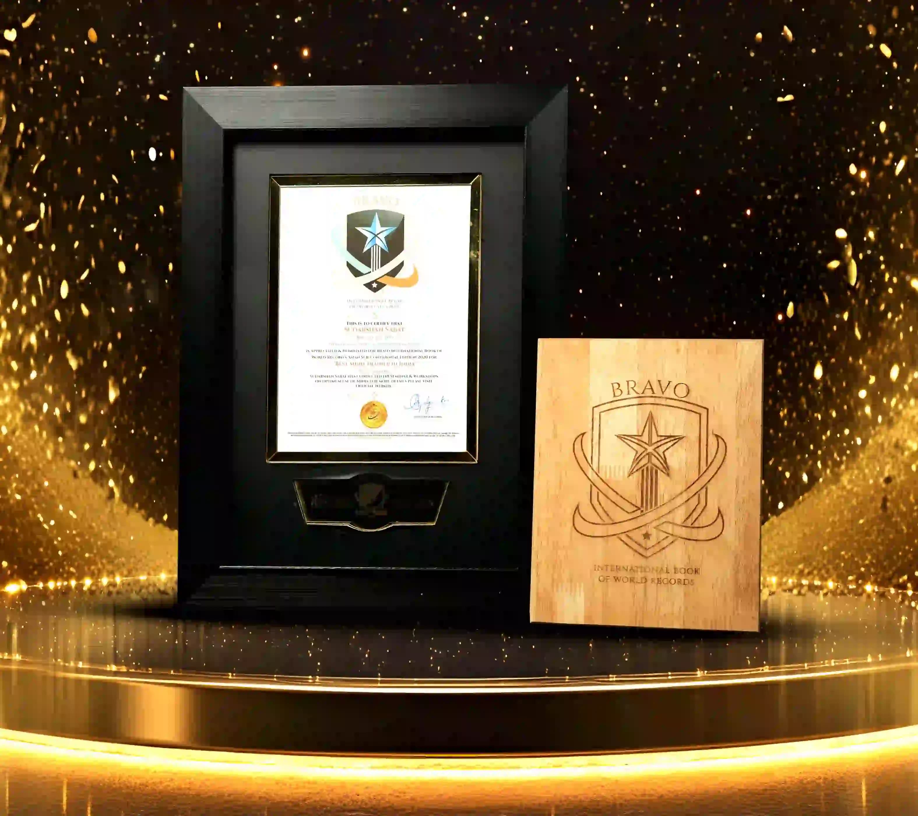Bravo International Book of World Records certificate and wooden plaque honoring Mr. Sudarshan Sabat as Best Mind Trainer in India.