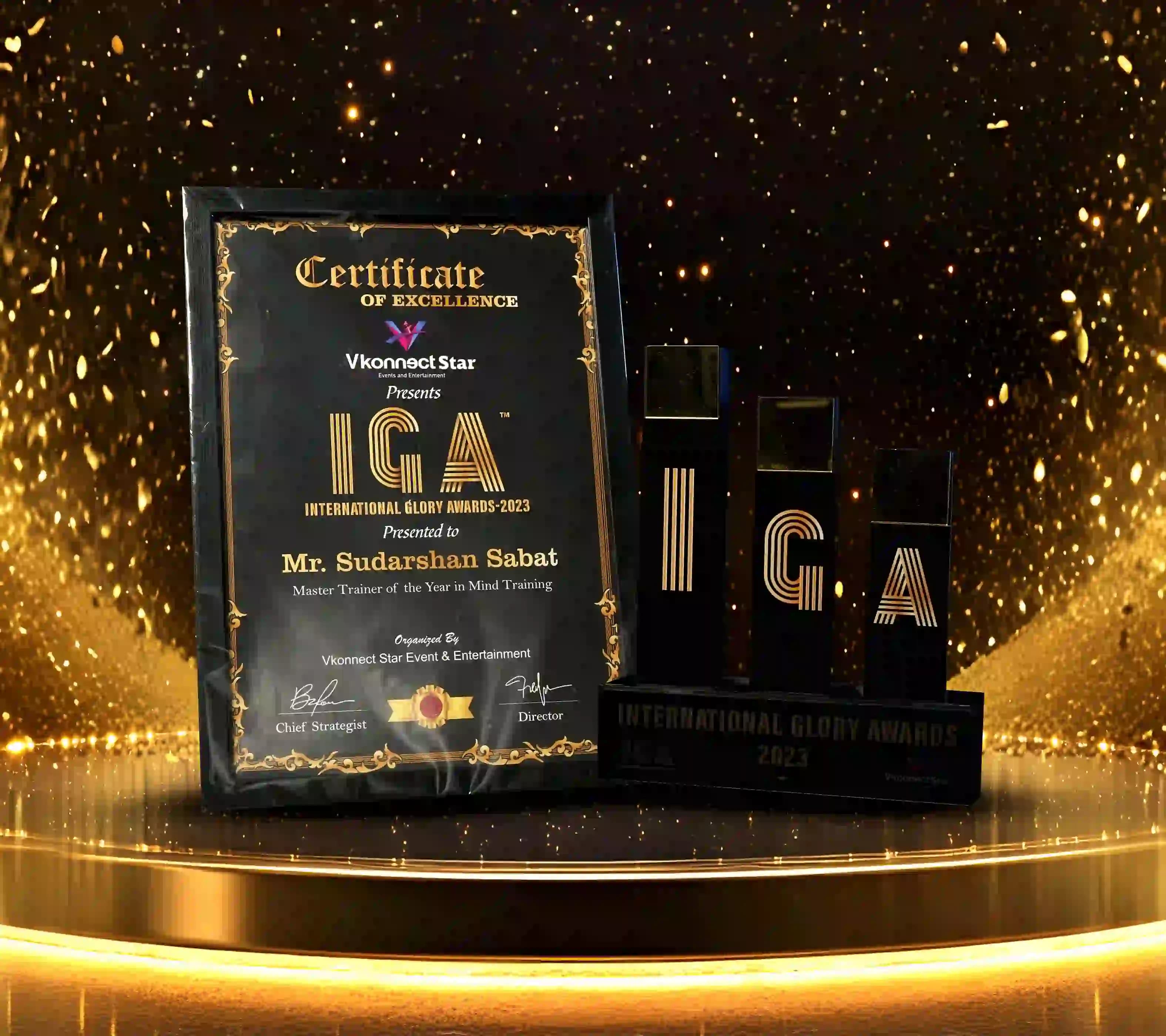 International Glory Awards 2023 certificate and trophy presented to Mr. Sudarshan Sabat as Master Trainer of the Year in Mind Training.